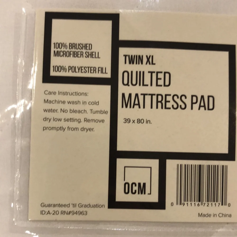 NWT Twin XL quilted mattress cover.
